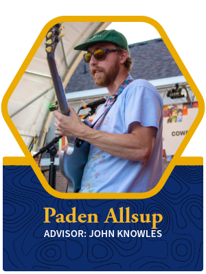 Paden Allsup bio photo of a man playing the guitar